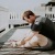 man stretching on a deck